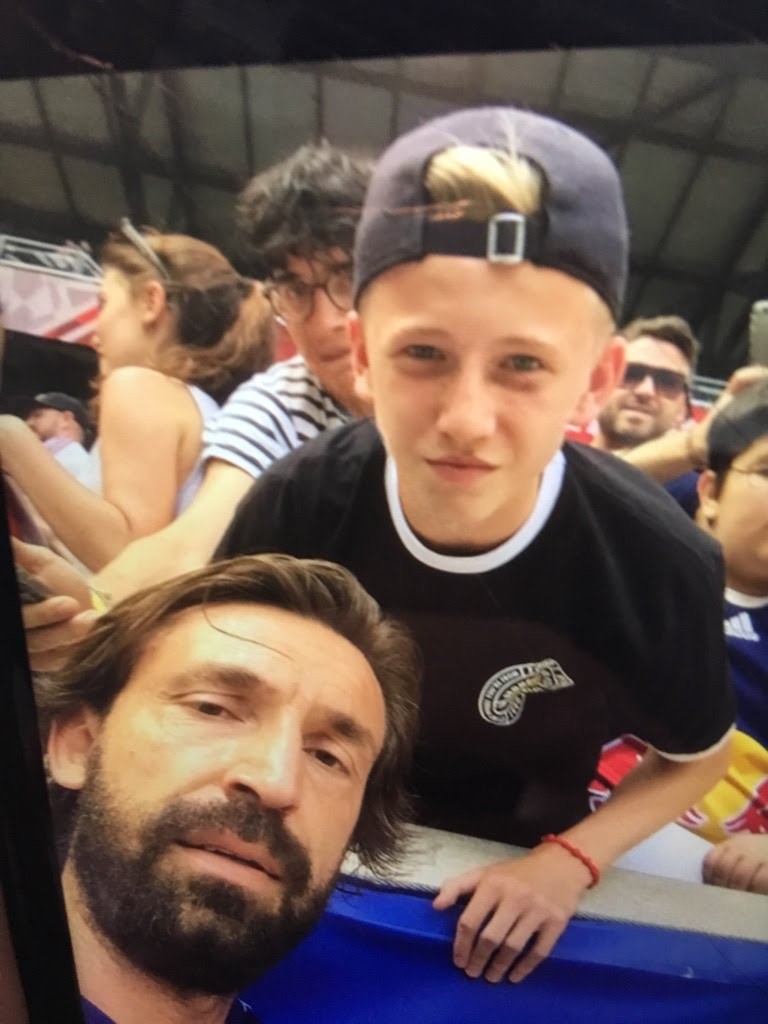 A young Josh Doig with Andrea Pirlo